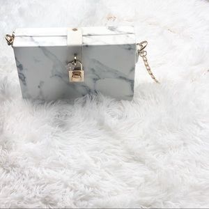 Marble clutch with gold chain